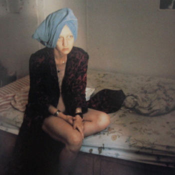 Nan Goldin, Suzanne on her bed, The Bowery NY, 1983